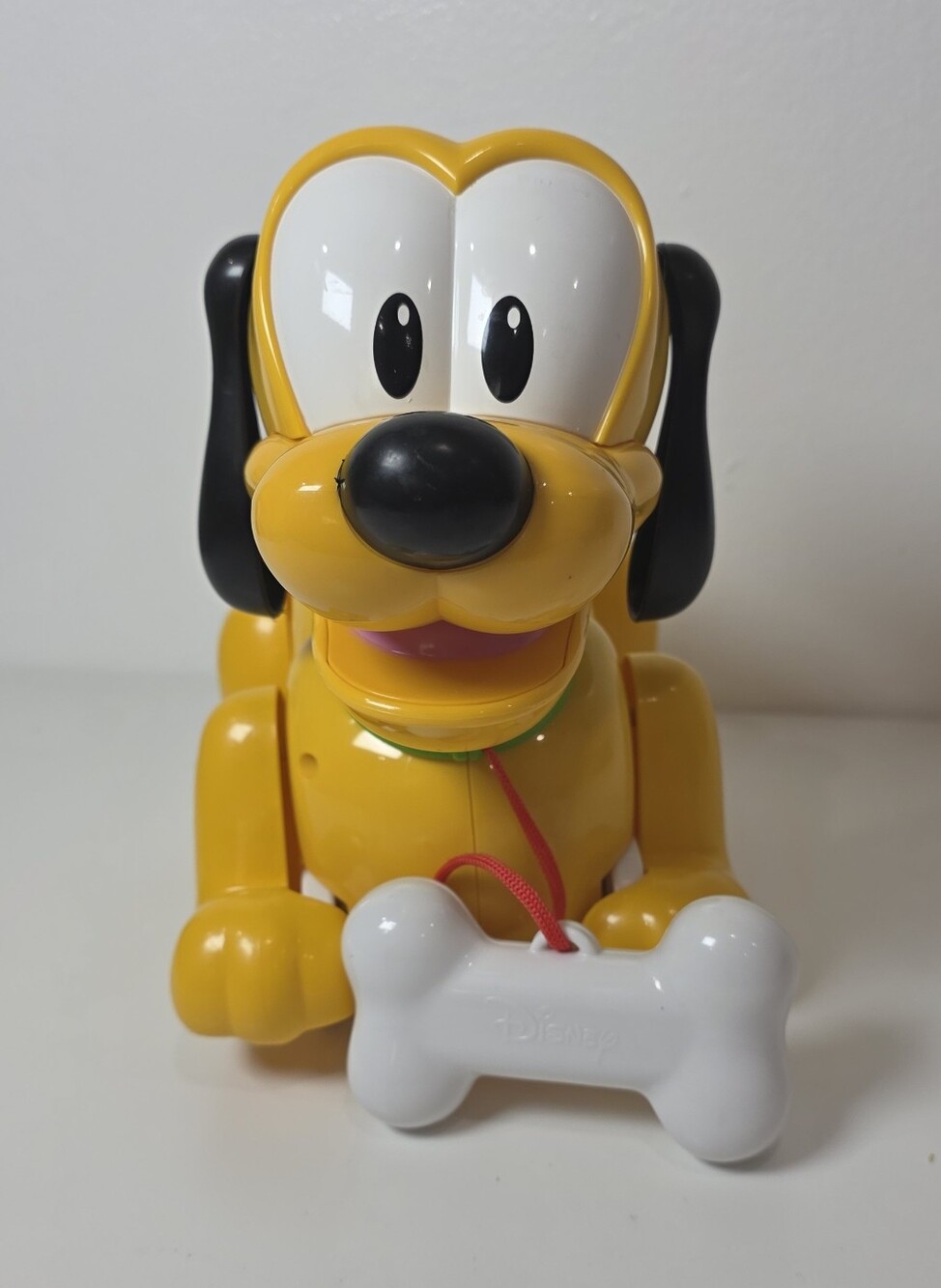 Disney's Animated Pluto pull toy With Bone- Barks and musical